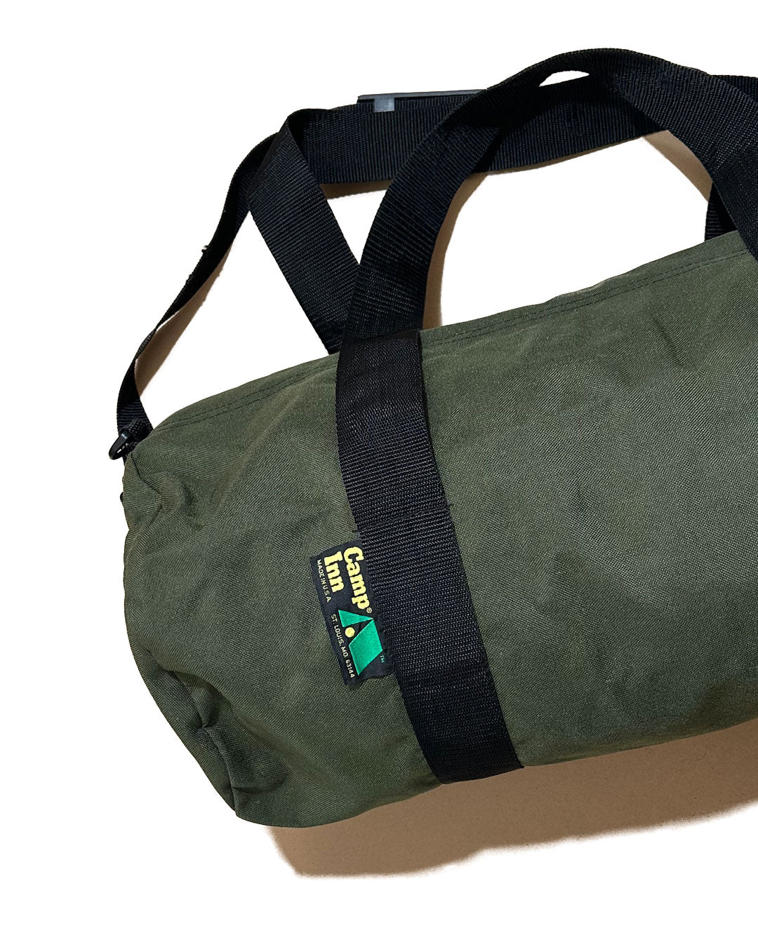 "80s Camp Inn” duffel bag